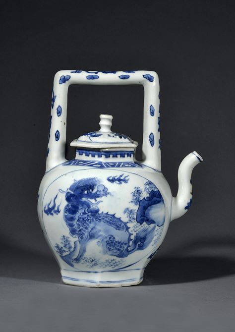 A wine jug with a depiction of  two mythical creatures: a qilin and a xiezhai