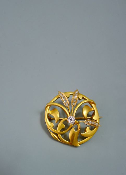 Art Nouveau gouden broche met diamant