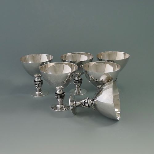 Six silver cups