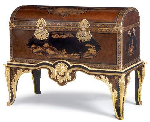 An impressive and large Japanese transition-style lacquer coffer with fine gilt copper mounts on a French Régence base, part possibly by André-Charles Boulle (1642-1732)