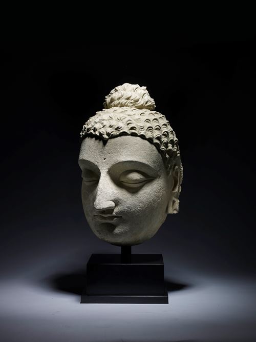Stucco hoofd van Buddha Shakyamuni