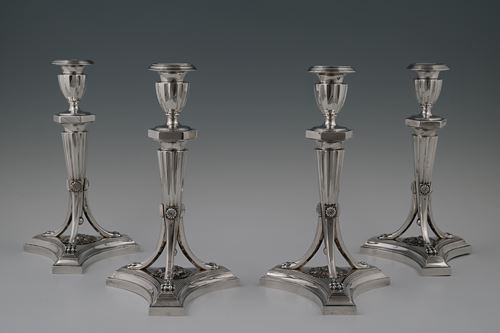 A set of four silver Dutch candlesticks