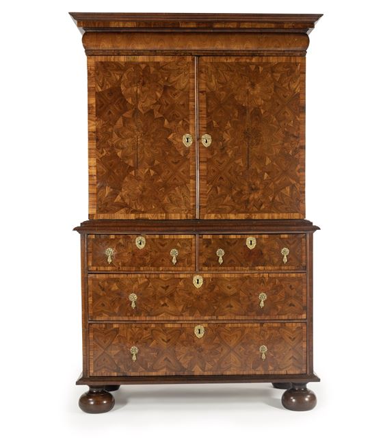 A William and Mary oyster veneered Kingwood cabinet on chest